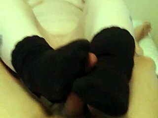 chubby foot fetish guy strokes cock in socks naked