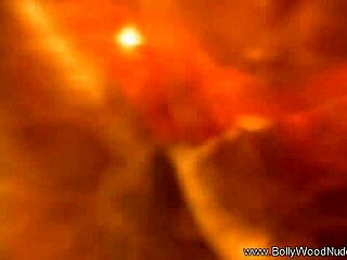 exotic brunette babe strips sensually letting passions rip clothes