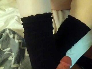 chubby foot fetish guy strokes cock in socks naked