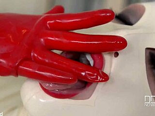 Latex goddess spanks and fingers herself solo