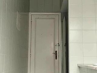 Sexy Guy Boldly Shaves Legs In Black Beach Shorts