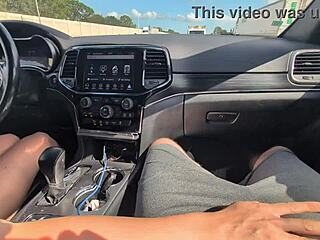 she strokes his cock for a messy handjob that explodes in huge cumshot while driving down the road