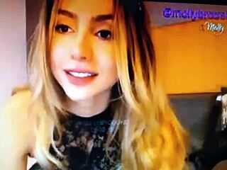 a sexy blonde captivates with her alluring look and flirty webcam talk