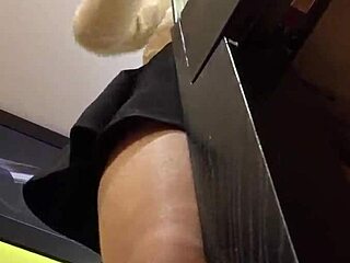 Peeking up hot asian skirt tease