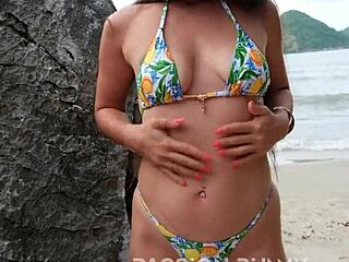 bikini babe dances teasing hidden beach spot