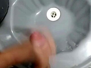guy jerks off furiously in bathroom after soccer match