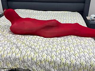 bound babe encased in tight pantyhose bondage cocoon stretching