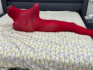 bound babe encased in tight pantyhose bondage cocoon stretching