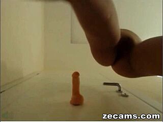 young small-tit blonde stuffs toys deep in her tight pussy