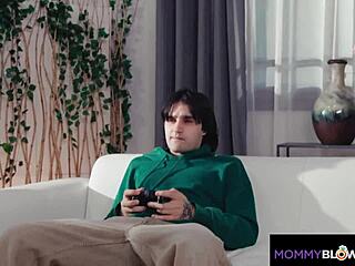 stepmom drops to knees slurping my cock mid-game play