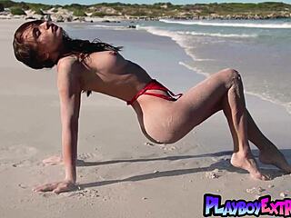 gloria sol strips naked posing her natural tits on beach