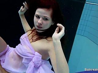 Aneta’s Big Tits Shine In Pool Dress