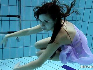 Aneta’s Big Tits Shine In Pool Dress