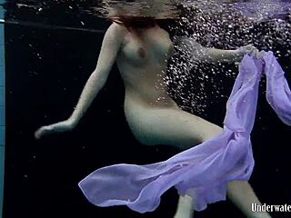 Aneta’s Big Tits Shine In Pool Dress