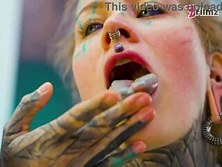 check out this tattooed babe's solo anal dildo play in fishnets heels and stockings