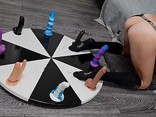 Petite Wife Spins Wheel of Dildos for Huge Orgasm Win!