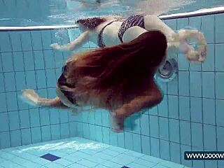 katrin and lucy flaunt massive tits underwater at russian beach pool