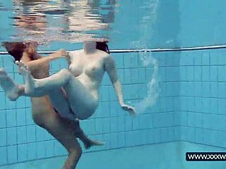 katrin and lucy flaunt massive tits underwater at russian beach pool