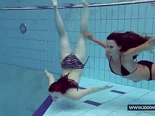 katrin and lucy flaunt massive tits underwater at russian beach pool