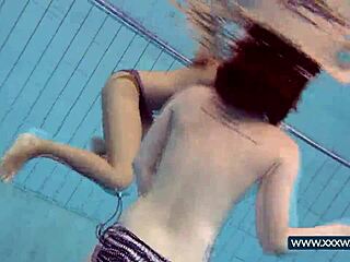 katrin and lucy flaunt massive tits underwater at russian beach pool