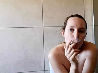 Cute Skinny Neighbor Smokes Seductively in Homemade Bathroom