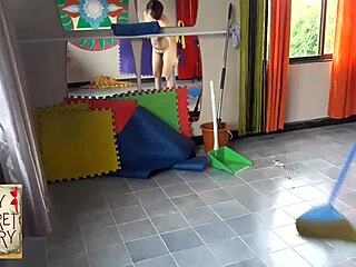 Nudist barbershop lady strips client naked in apron backstage