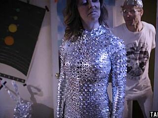 Nerd guy pounds busty astronaut milf then takes her strapon deep