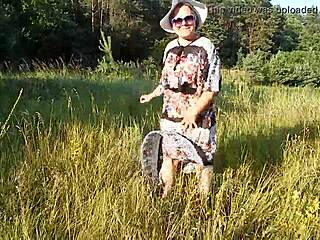 hairy mature flashes her chubby beaver through see-through skirt on nudist beach