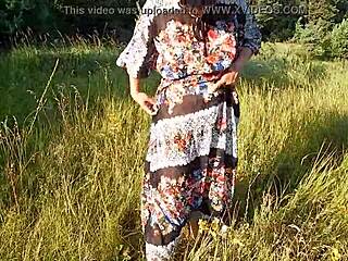 hairy mature flashes her chubby beaver through see-through skirt on nudist beach