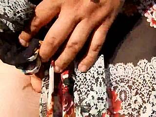 hairy mature flashes her chubby beaver through see-through skirt on nudist beach