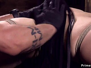 hogtied babe's ass whipped hard then caned roughly with dildo gags