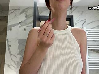 long legged nerdy coed flashes pink skirt and panties in bathroom