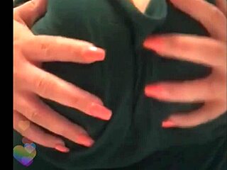 horny mommy teases her big black tits!