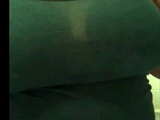 horny mommy teases her big black tits!