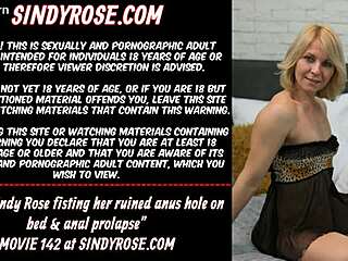 sexy sindy rose fists her prolapsed pussy and anus on bed