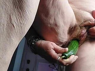 granny fucks her old hairy pussy deep with big cucumber