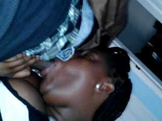 Fat black girl sucks cock close up