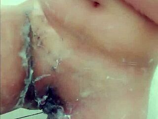 uhh hot young girl showering while getting her pussy waxed...
