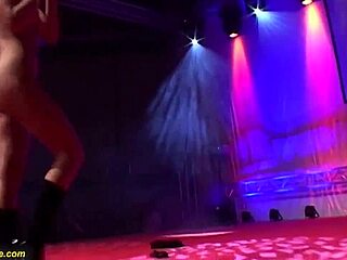 Flexible Babe in Fishnets Delivers Wild Strapon Lap Dance on Public Stage