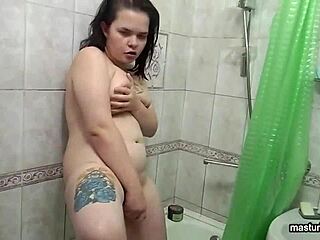Plump tattooed Alice toys fat ass in shower cum