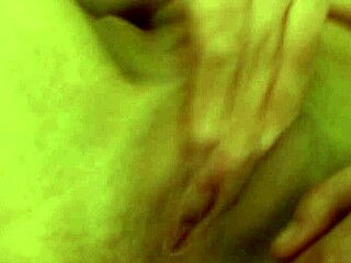 horny young babe fingers her shaved wet pussy