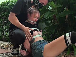 Tickle punishing blonde teen's sexy outdoor feet hard
