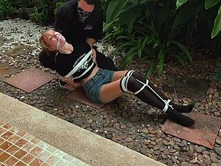 Tickle punishing blonde teen's sexy outdoor feet hard