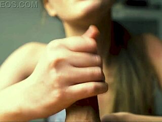 Red lip beauty jerks boyfriend's cock close-up to explosive cumshot peak