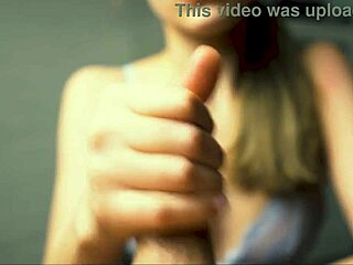 Red lip beauty jerks boyfriend's cock close-up to explosive cumshot peak