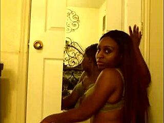 sexy girl dances in mirror wearing bra and undies
