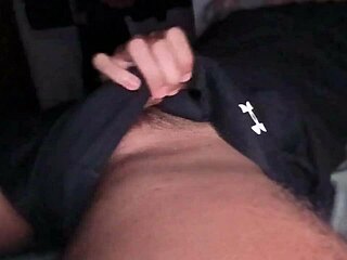 Muscular stud strokes massive cock in tight gym clothes moaning wildly on bed