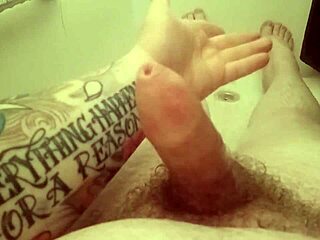 solo guy strokes cock in steamy shower spray