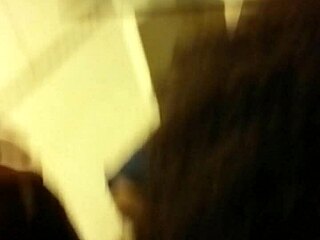 Curly haired girl sucks cock on hidden cam