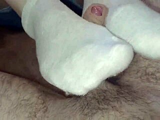 Homemade teen neighbor socksjob ends with cum explosion